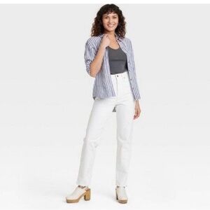 Women's White Universal Thread 90s Vintage Stretch Jeans with frayed hem.